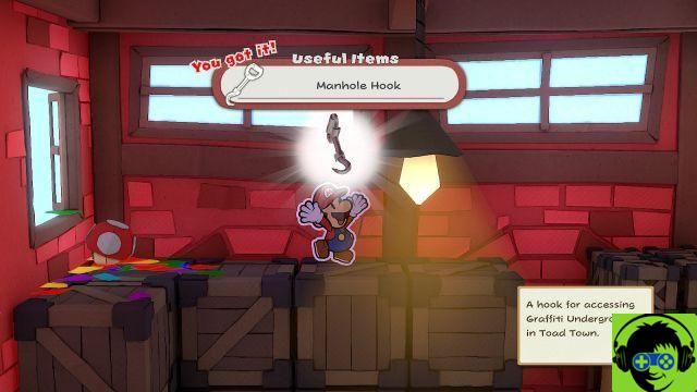 Cómo llegar al castillo de Peach y encontrar un gancho de alcantarilla en un pueblo sapo en Paper Mario: The Origami King