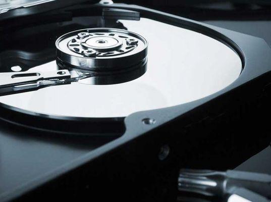 How to find the applications that are writing to my hard drive in Windows