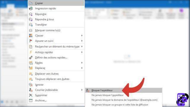 How do I report an email address as spam in Outlook?